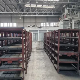 Production line for vibro-pressed concrete elements